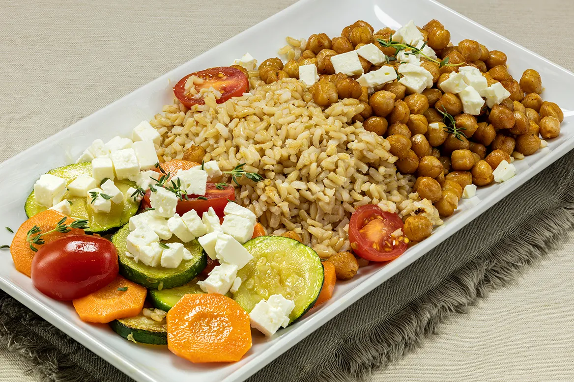 About Thyme — brown rice, roasted chickpeas, carrots, zucchini and sliced cherry tomatoes with fresh thyme and feta cheese