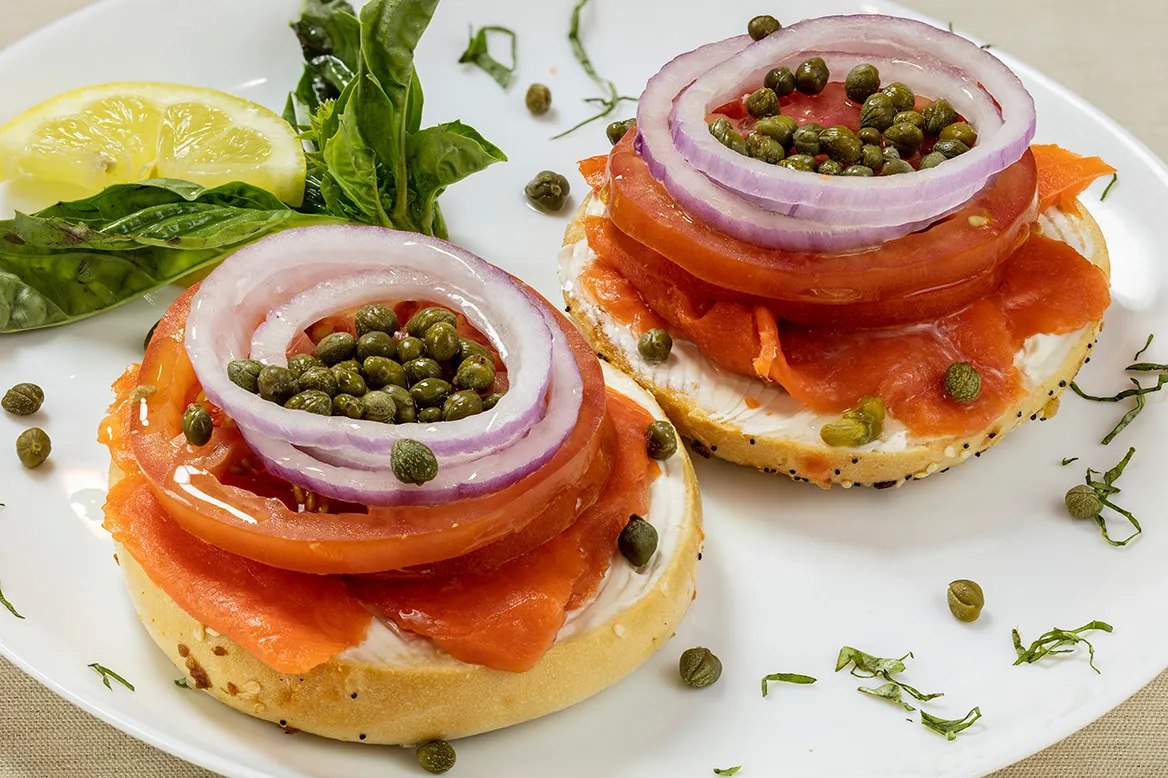 Bagel & Lox Platter — open faced bagel with cream cheese, wild-caught Alaskan smoked salmon, red onion, tomato and capers
